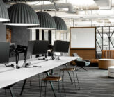 Digney York Associates collaboration area with long tables and monitors