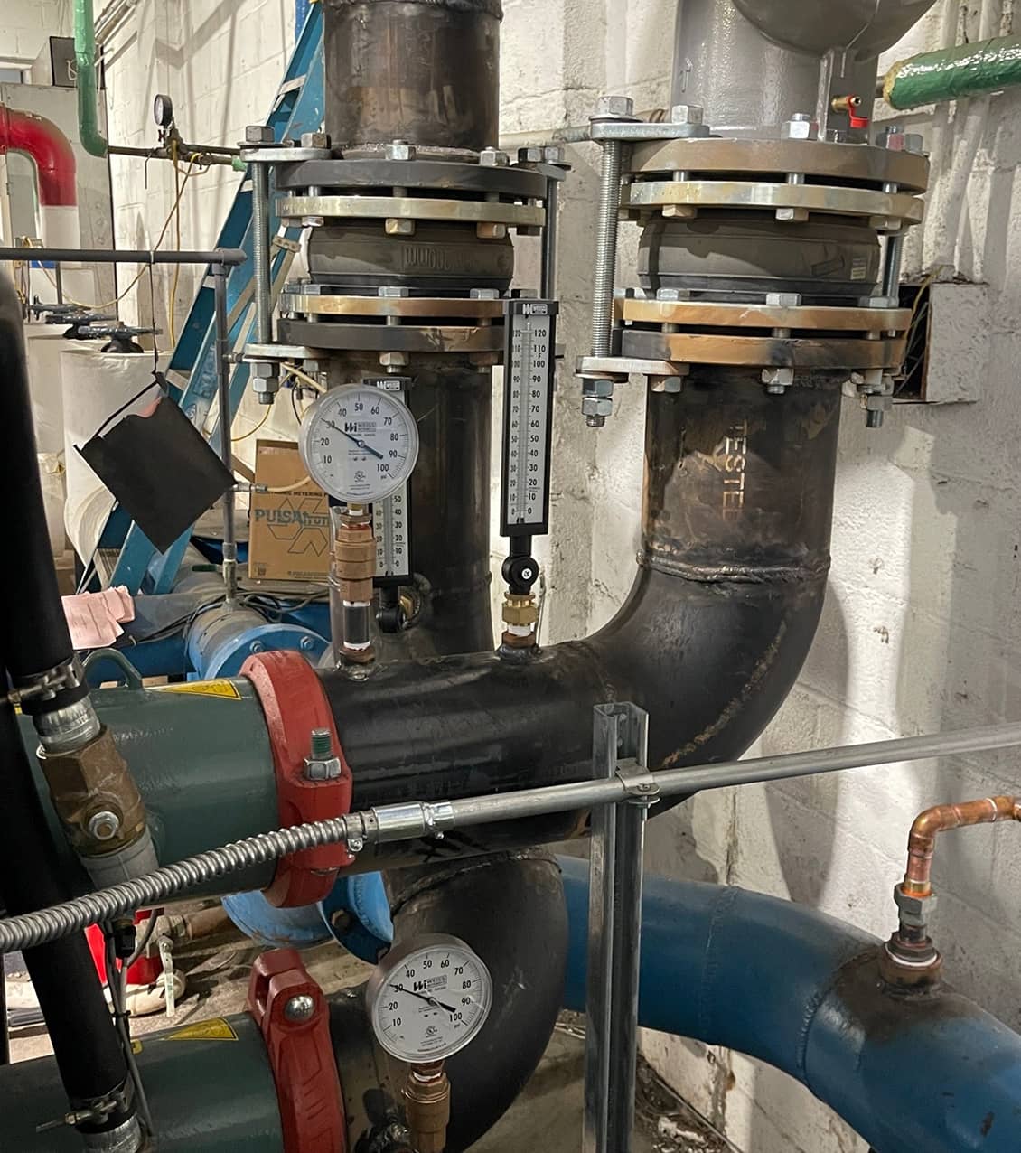 Close up image of pipes and pressure valves