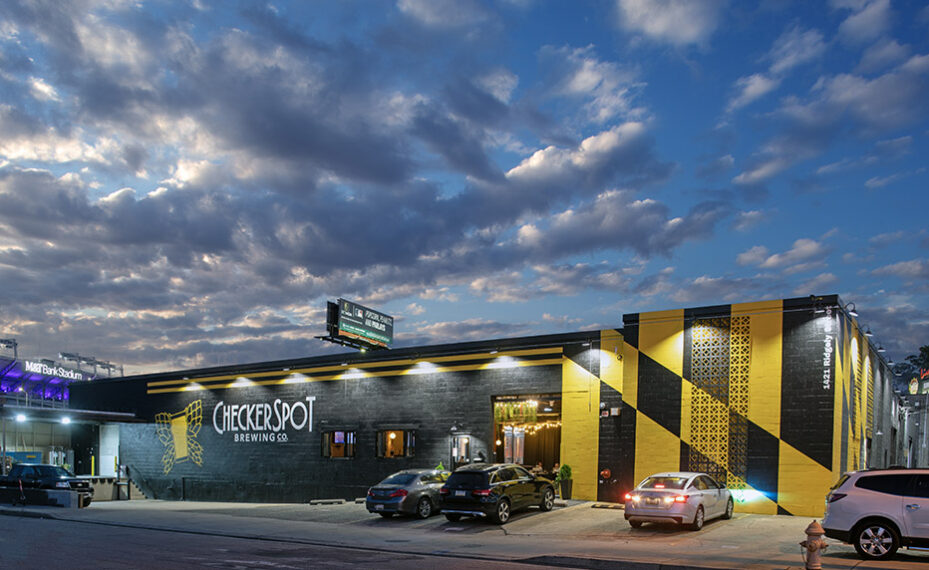 Checkerspot Brewery exterior from side at twilight