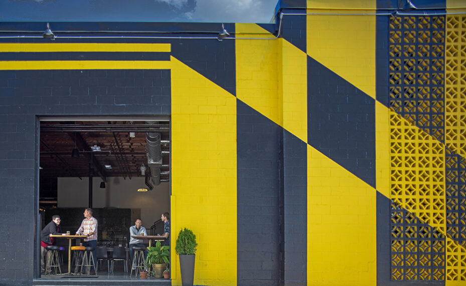 Checkerspot Brewery exterior from side with open garage door