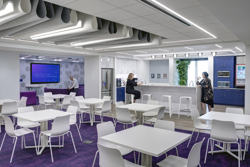 Leidos Annex break room with people at counter