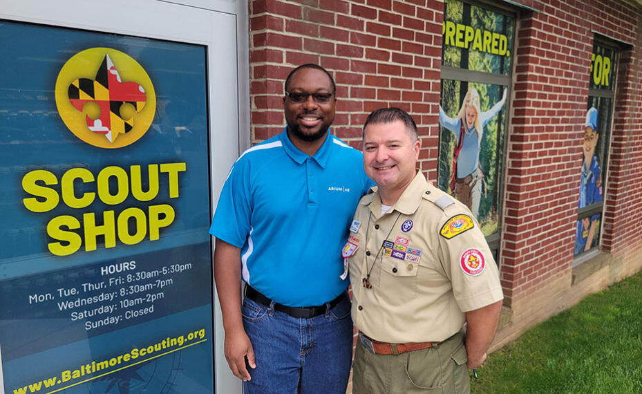 BSA Scout Shop exterior with two people posing