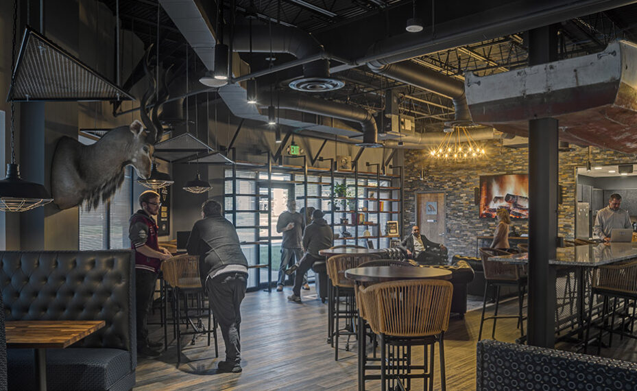 Kudu Dynamics office interior photo of cafe tables and shelving